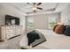 Main bedroom with a large dresser, carpet flooring, and two large windows with plenty of natural light at 2300 Whiteoak Drive Southeast Se Dr, Smyrna, GA 30080
