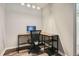 Bright office space with wood desk and a comfortable rolling chair, creating an ideal work area at 2300 Whiteoak Drive Southeast Se Dr, Smyrna, GA 30080