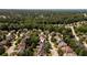 Desirable neighborhood featuring tree-lined streets and well-maintained homes with mature landscaping at 2484 Mossy Branch Dr, Snellville, GA 30078