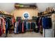 Walk-in closet offering ample storage and organization space at 2484 Mossy Branch Dr, Snellville, GA 30078