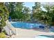 Community pool with lap lanes and diving board is perfect for exercise and recreation at 2484 Mossy Branch Dr, Snellville, GA 30078