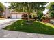 Beautiful brick home with a two-car garage and a meticulously maintained lawn and front yard at 2484 Mossy Branch Dr, Snellville, GA 30078