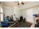 Home gym featuring a weight bench, free weights, and a treadmill at 2484 Mossy Branch Dr, Snellville, GA 30078