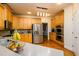 Kitchen featuring stainless steel appliances, granite countertops, and ample maple cabinets at 2484 Mossy Branch Dr, Snellville, GA 30078