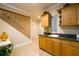 Spacious laundry room with a sink, cabinets, tile floor, and access to stairs at 2484 Mossy Branch Dr, Snellville, GA 30078