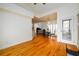 Bright living room featuring hardwood floors and glass door to backyard at 2484 Mossy Branch Dr, Snellville, GA 30078