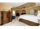 Spacious main bedroom features carpeted floors and a trey ceiling at 2484 Mossy Branch Dr, Snellville, GA 30078