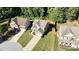 Charming single-Gathering house featuring a two-car garage, a well-manicured lawn and a beautifully landscaped front yard at 3537 Edenridge Ct, Buford, GA 30519