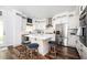 Modern kitchen with stainless steel appliances, a center island, and counter seating at 3537 Edenridge Ct, Buford, GA 30519