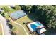 Community amenities include an outdoor pool, a tennis court, and a clubhouse, nestled in a lush green neighborhood at 3537 Edenridge Ct, Buford, GA 30519