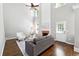 Spacious living room featuring high ceilings, a fireplace, and lots of natural light at 5060 Winship Ct, Alpharetta, GA 30009