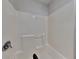 The bathroom featuring a shower and a shower faucet at 514 Jadetree Ln, Atlanta, GA 30349