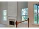 Close-up of the fireplace in the living room, showcasing its detailed mantel and design at 514 Jadetree Ln, Atlanta, GA 30349