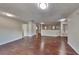 Hardwood floor living area with neutral walls and views to multiple rooms in the house at 514 Jadetree Ln, Atlanta, GA 30349