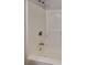 Close-up of the shower fixtures inside a tub-shower combination at 514 Jadetree Ln, Atlanta, GA 30349