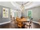 Dining room with decorative ceiling, light fixture, and hardwood floors at 5860 Riverwood Dr, Sandy Springs, GA 30328