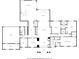 Floor plan of the home, with a large kitchen, multiple bedrooms, and a three-car garage at 5860 Riverwood Dr, Sandy Springs, GA 30328