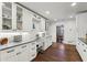Bright built-in office space featuring white cabinetry and granite countertops at 5860 Riverwood Dr, Sandy Springs, GA 30328