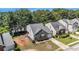 Aerial shot of a single-Gathering home featuring a well-manicured lawn and a charming facade at 855 Lakeside Cir, Covington, GA 30016