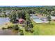 An aerial view of the neighborhood pool and clubhouse situated on a peninsula at 855 Lakeside Cir, Covington, GA 30016