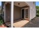 Private back patio with double doors, perfect for outdoor entertaining at 855 Lakeside Cir, Covington, GA 30016