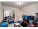 Bedroom featuring neutral walls, carpet flooring, and a sliding door closet for ample storage space at 855 Lakeside Cir, Covington, GA 30016