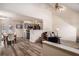 Open-concept living space with dining area, kitchen, and high ceilings for modern living at 855 Lakeside Cir, Covington, GA 30016