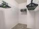 Walk-in closet with wire shelving for clothes and carpeted flooring at 855 Lakeside Cir, Covington, GA 30016