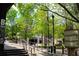 Scenic view of Decatur Square featuring lush greenery, walking paths, and directory sign at 132 Olympic Pl, Decatur, GA 30030