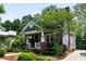 Beautiful two-story home featuring a cozy front porch and a well-maintained yard at 132 Olympic Pl, Decatur, GA 30030
