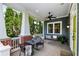 Inviting front porch with a porch swing, seating area, and stylish decor at 132 Olympic Pl, Decatur, GA 30030