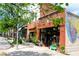 Quaint street view of brick buildings housing shops, boutiques, and restaurants with street trees at 132 Olympic Pl, Decatur, GA 30030