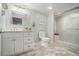 Stylish bathroom with marble floors and glass-enclosed shower at 402 Lake Point Trce, Canton, GA 30114