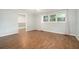 Bright bedroom featuring hardwood floors and walk-in closet at 402 Lake Point Trce, Canton, GA 30114