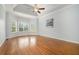 Spacious bedroom boasts beautiful hardwood floors and bright windows at 402 Lake Point Trce, Canton, GA 30114