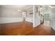 Formal dining room with hardwood floors, wainscoting, and a modern chandelier at 402 Lake Point Trce, Canton, GA 30114