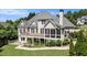 Back exterior view of home features spacious decks at 402 Lake Point Trce, Canton, GA 30114