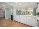 Kitchen area featuring a countertop, view into living room, and abundant natural light at 402 Lake Point Trce, Canton, GA 30114