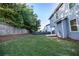 Fenced backyard offers ample green space and privacy, perfect for outdoor activities at 4305 Huron Dr, Cumming, GA 30028