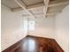 Dining room with hardwood floors, decorative molding, and a modern light fixture at 4305 Huron Dr, Cumming, GA 30028