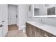 Bathroom with a modern vanity and a large, illuminated mirror at 775 Juniper Ne St # 327, Atlanta, GA 30308