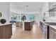Bright, open kitchen with stainless steel appliances and a large center island at 775 Juniper Ne St # 327, Atlanta, GA 30308