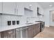 Well-equipped kitchen with stainless steel appliances and designer cabinetry at 775 Juniper Ne St # 327, Atlanta, GA 30308