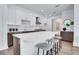 Contemporary kitchen featuring island with seating, stainless appliances, and modern finishes at 775 Juniper Ne St # 327, Atlanta, GA 30308
