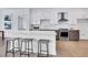 Modern kitchen with island seating, stainless steel appliances and sleek cabinets at 775 Juniper Ne St # 327, Atlanta, GA 30308