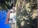 The exterior back of the home, which includes a wooden deck and green grass at 1132 Se Oak Knoll Se Ter, Atlanta, GA 30315