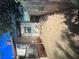 A back view of the home with a deck and grassy lawn at 1132 Se Oak Knoll Se Ter, Atlanta, GA 30315