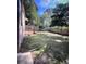 Inviting backyard featuring a wooden deck, a grassy area, and mature trees, creating a serene and private outdoor space at 1132 Se Oak Knoll Se Ter, Atlanta, GA 30315