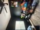 Finished basement area with display shelving and black walls at 1132 Se Oak Knoll Se Ter, Atlanta, GA 30315