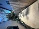 View of the property's side yard, showcasing a well-maintained fence, a narrow concrete walkway, and a manicured lawn at 1132 Se Oak Knoll Se Ter, Atlanta, GA 30315